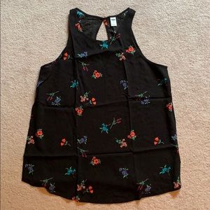Black tank top with floral designs. Size S